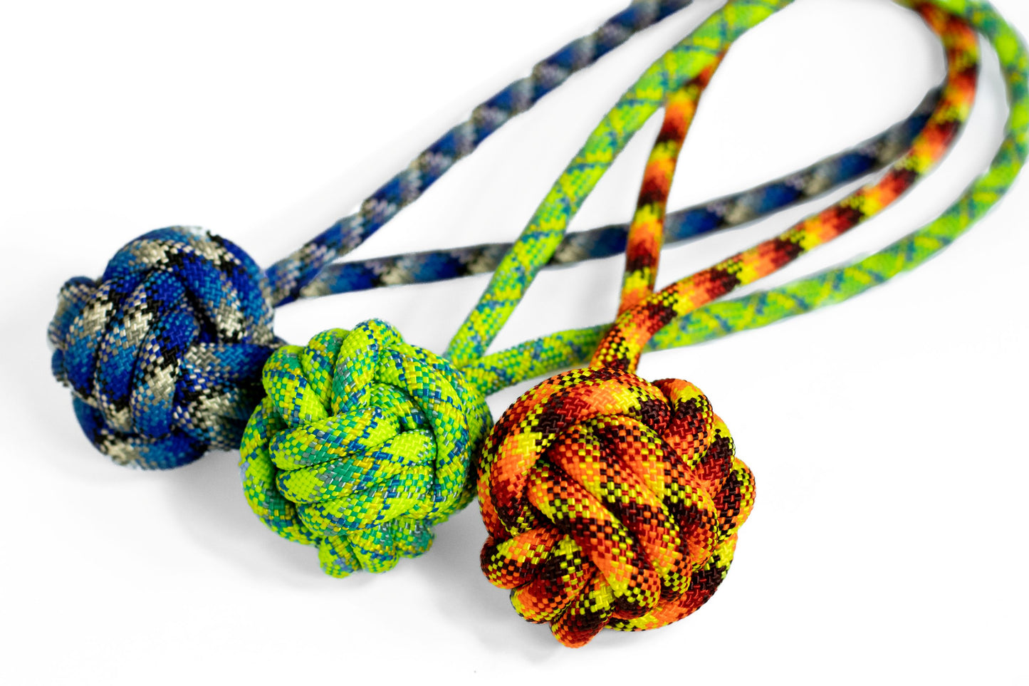 Colorful knotted ropes on a white background